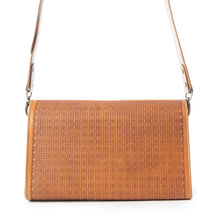 The sophisticate hand-tooled purse